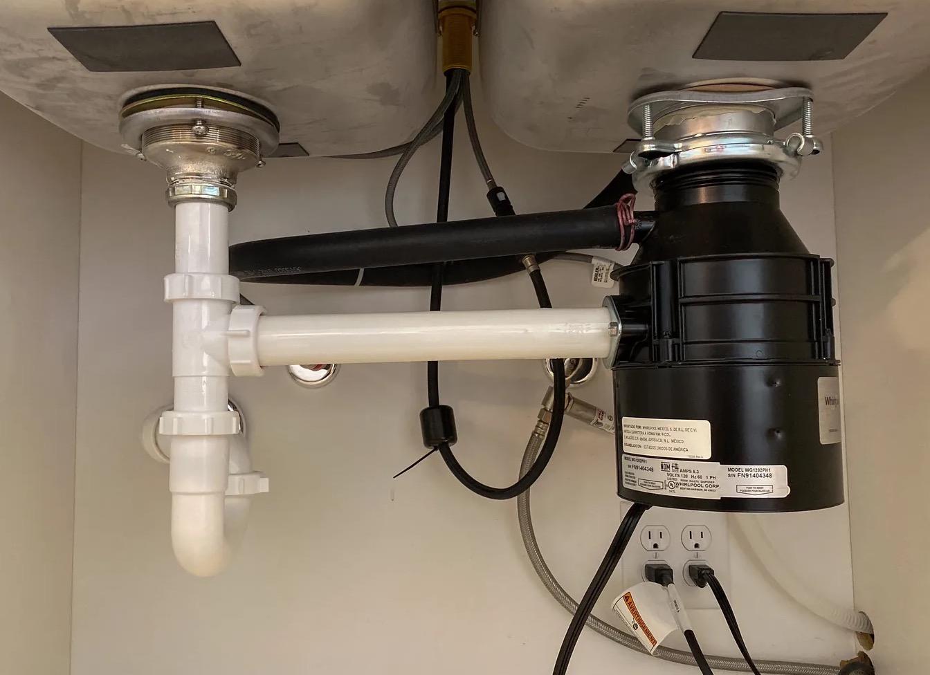 Leaky Garbage Disposal Cleanup in Alpharetta, GA